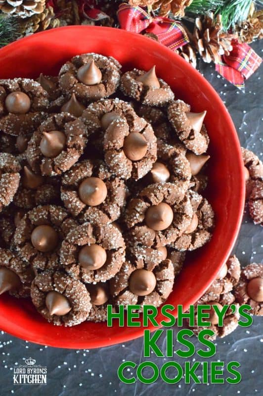A deliciously decadent chocolate cookie, coated in sugar, and topped with a chocolate kiss, Hershey's Kiss Cookies are a perfect holiday treat that everyone will love! Want my advice? Make a lot of these, because they will disappear quite quickly! #hersheys #kiss #cookies #christmas #holiday #baking