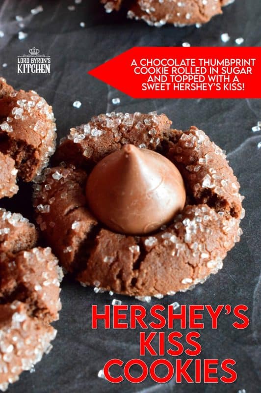 A deliciously decadent chocolate cookie, coated in sugar, and topped with a chocolate kiss, Hershey's Kiss Cookies are a perfect holiday treat that everyone will love! Want my advice? Make a lot of these, because they will disappear quite quickly! #hersheys #kiss #cookies #christmas #holiday #baking