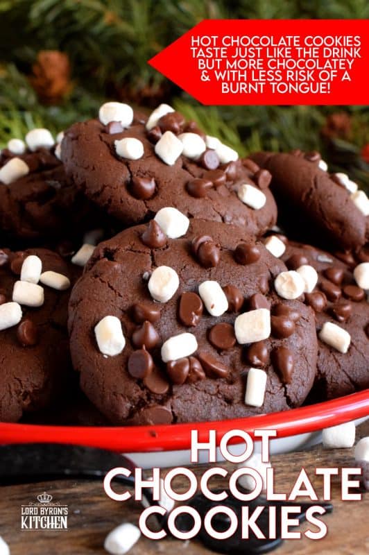 Hot Chocolate Cookies are slightly crispy on the outside, with a moist and dense chocolaty center; complete with mini marshmallow bits! These are substantial cookies, meaning that they are thick and filling. Great for dunking in hot chocolate too! #hotchocolate #hot #chocolate #cookies #marshmallow #bits
