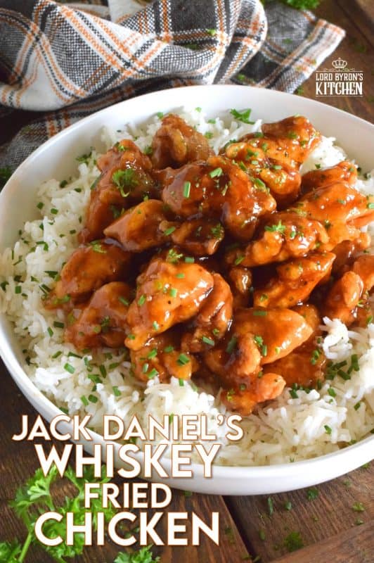This crispy fried chicken is slathered in a thick, sweet, homemade sauce with a good splash of whiskey. Jack Daniel's Whiskey Fried Chicken uses skinless, boneless chicken thighs which have more flavour and hold up well to the hot oil. With my double fry method, your chicken will stay crispy even after soaking up that delicious sauce too! #whiskey #jackdaniels #whiskeychicken #friedchicken #sweetandsticky #sauce