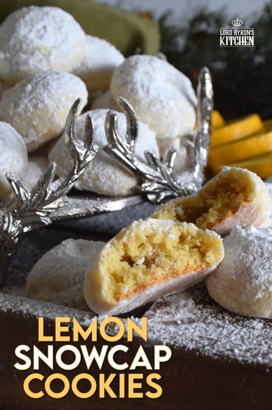 If you love lemon, then get ready to pucker up! Lemon Snowcap Cookies are delightfully bright and tart; they're soft and moist, and they melt in your mouth. I bet you can't eat just one! #lemon #lemony #powderedsugar #cookies #snowcap #christmas #holiday #baking