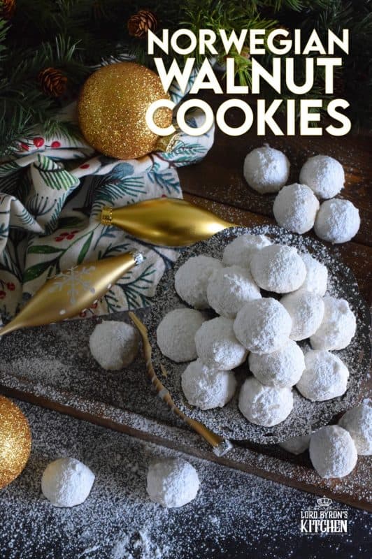 This cookie is all about the walnuts. Norwegian Walnut Cookies are loaded with them and liberally dusted with confectioner's sugar. They're a perfect pop-in-your-mouth, one-bite cookie! These are great for packing into little bags or boxes as a gift! #walnut #butter #cookies #norwegian #christmas #holiday #baking