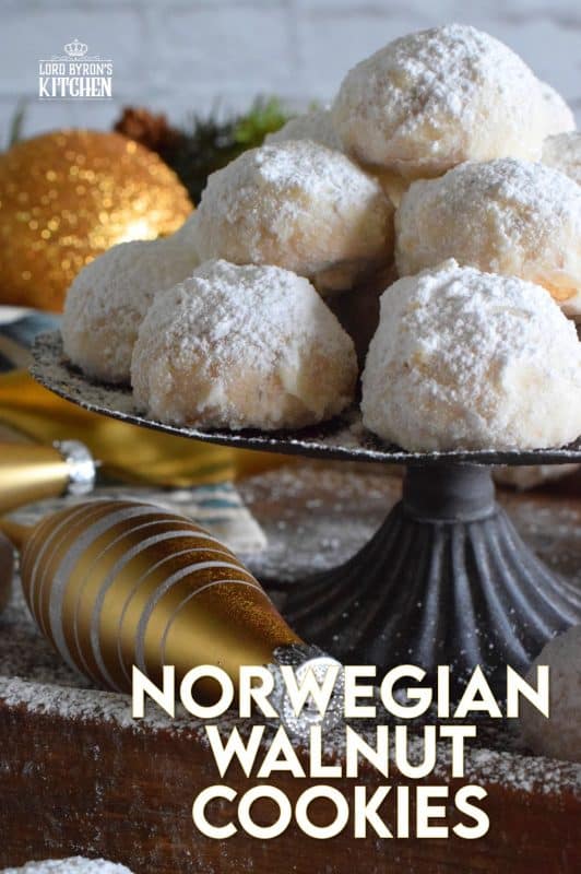This cookie is all about the walnuts. Norwegian Walnut Cookies are loaded with them and liberally dusted with confectioner's sugar. They're a perfect pop-in-your-mouth, one-bite cookie! These are great for packing into little bags or boxes as a gift! #walnut #butter #cookies #norwegian #christmas #holiday #baking