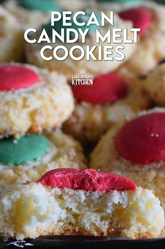 Loaded with chopped pecans, these Pecan Candy Melt Cookies are prepared with cream cheese and topped with a single candy melt. A soft, nutty cookie with just the right amount of sweetness; and cute too! Who says thumbprint cookies must have jam!? #pecan #candymelts #wilton #cookies #christmas #holiday #baking