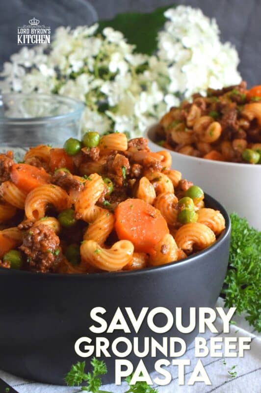 Savoury Ground Beef Pasta is a wonderful fall-inspired dish which is prepared in less than 45 minutes. With ingredients like beef, carrots, onions, tomatoes, peas, and thyme, who could resist? This is not your average ground beef pasta; this is hearty, comforting, and perfect for the cooler months ahead. #groundbeef #pasta #beef #family