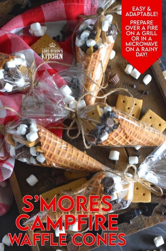 Prepare a bunch of these S'mores Campfire Waffle Cones and wrap them in aluminum foil. Set them onto a grilling rack over the fire for a few minutes and they will be all melty and gooey on the inside, but contained within the cone. No more sticky fingers! Serve the cones with a spoon and enjoy! #campfire #smores #wafflecones #marshmallow