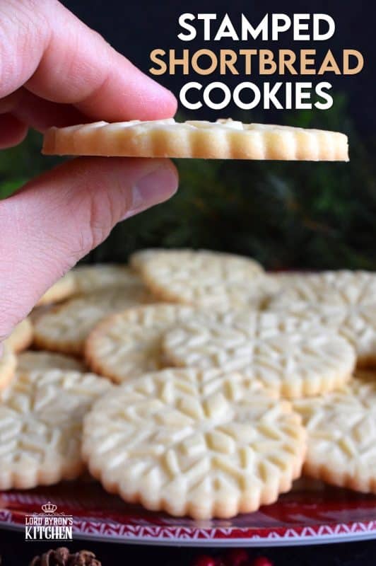 A perfect treat for anyone at anytime; Stamped Shortbread Cookies are buttery and delightfully bright and vibrant to match the holiday season! Using a cookie stamp is a great way to make a simple, homemade shortbread a beautiful cookie! #shortbread #cookie #stamp #stamped #christmas #holiday #baking