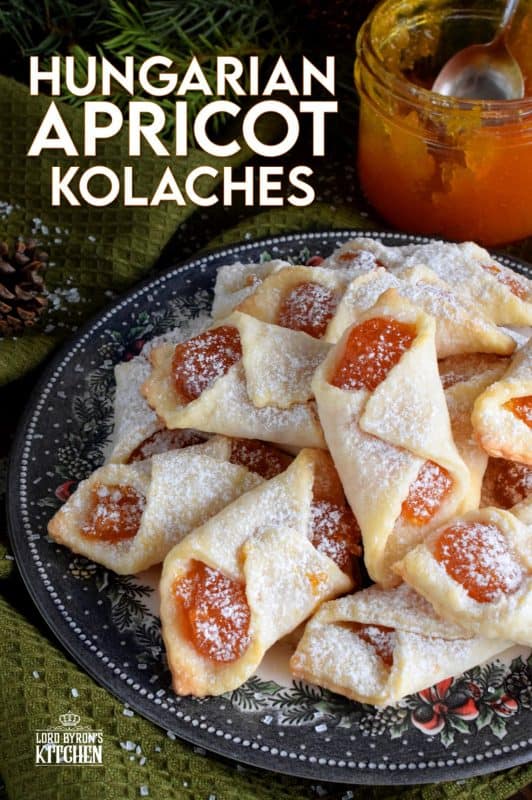Traditional Hungarian Kolaches are cookies made with a cream cheese dough and filled with apricot jam; they are very common at Christmastime. These are the type of cookies that makes it hard to just have one! Perfect with an afternoon coffee on a stormy winter day! #christmas #holiday #baking #hungarian #kolaches #traditional #cookies #jam