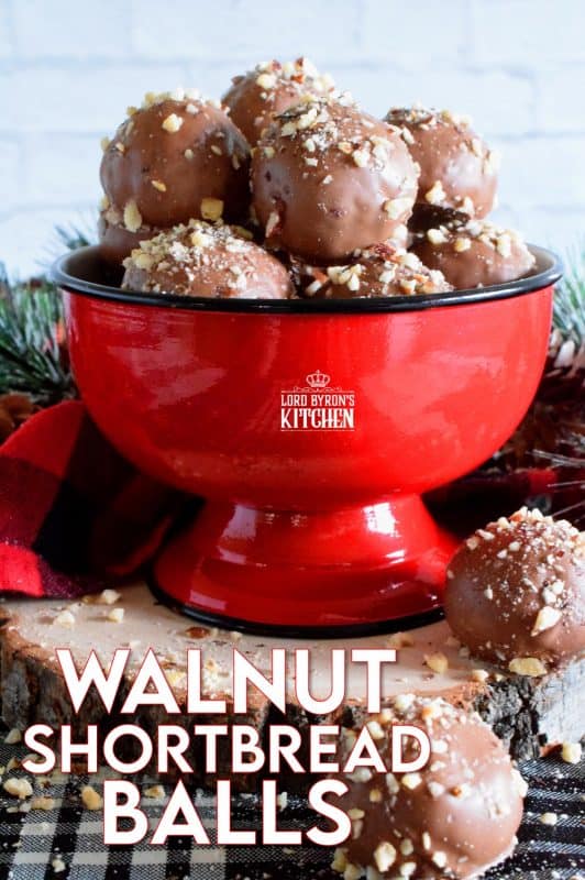 For this cookie, I've taken a shortbread recipe, stuffed it with chopped walnuts, baked them into balls, and dipped them in melted chocolate. Walnut Shortbread Balls are a new take on a Christmas classic! #walnut #shortbread #chocolate #balls #christmas #holiday #baking