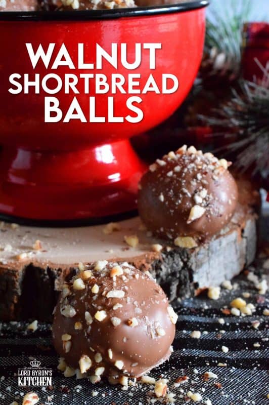 For this cookie, I've taken a shortbread recipe, stuffed it with chopped walnuts, baked them into balls, and dipped them in melted chocolate. Walnut Shortbread Balls are a new take on a Christmas classic! #walnut #shortbread #chocolate #balls #christmas #holiday #baking