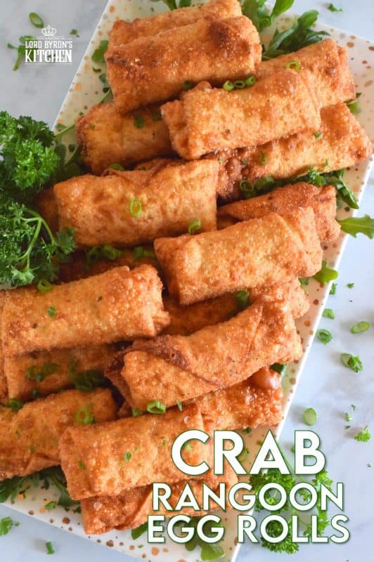 Stuffed with crab and cream cheese, and rolled into an egg roll wrapper, these Crab Rangoon Egg Rolls are deep fried until golden and crispy. The filling is warm and super creamy, and it is flavoured with green onions, Worcestershire sauce, mayo, vinegar, and seasonings. I bet you can't eat just one - it's a bet I never lose! #crab #rangoons #appetizer #imitationcrab #seafood #eggrolls 