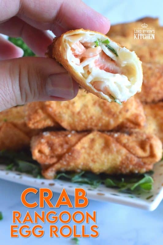 Stuffed with crab and cream cheese, and rolled into an egg roll wrapper, these Crab Rangoon Egg Rolls are deep fried until golden and crispy. The filling is warm and super creamy, and it is flavoured with green onions, Worcestershire sauce, mayo, vinegar, and seasonings. I bet you can't eat just one - it's a bet I never lose! #crab #rangoons #appetizer #imitationcrab #seafood #eggrolls