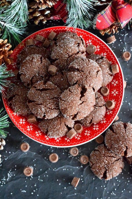 For the ultimate chocolate lover, these Rolo Stuffed Cookies are prepared with a rich chocolaty and fudgy base, which is wrapped around a single Rolo candy. When you bite into one of the cookies, milk chocolate and caramel oozes out - sounds indulgent, right? Perfect for Christmastime, when calories don't count! #christmas #holiday #baking #cookies #rolo #stuffedcookies #caramel #chocolate
