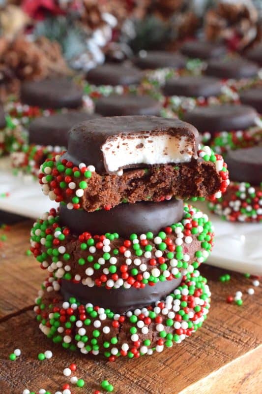 Christmastime is synonymous with thumbprint cookies, most often prepared with chocolates or preserves. So, let's shake it up a bit by pressing chocolate mint patties into the cookie dough. These are the perfect holiday confection for the mint lover in your life! #yorkpeppermint #peppermint #patties #mint #christmas #holiday #baking #thumbprint #cookies