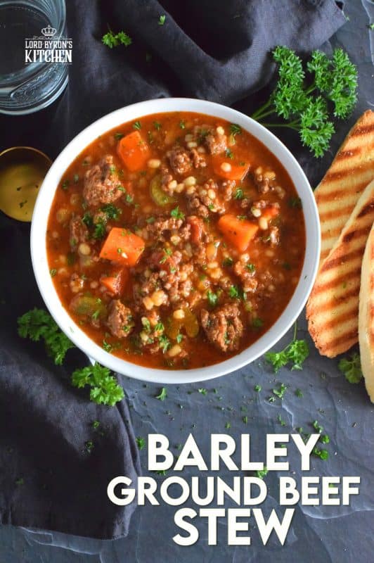Traditionally, beef stew is made with chuck and can be pricey for the budget-conscious family. Using inexpensive ground beef is a great solution. It's readily available and affordable too. Paired with barley and a few vegetables, this stew is simply delicious! #beef #groundbeef #barley #stew #beefstew