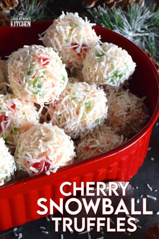 This truffle is a sweet combination of coconut, red and green candied cherries, and sweetened condensed milk. Cherry Snowball Truffles are just slightly soft and gooey. These are not only extremely festive, but super easy to make and freezer-friendly too! #truffles #christmas #holiday #nobake #cherry #redandgreen #candied #cherries #coconut