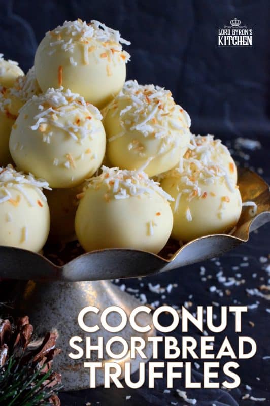You will not believe how easy these Coconut Shortbread Truffles are to prepare! With lots of coconut flavour, these truffles are made with crumbled shortbread cookies and dipped in velvety white chocolate. Be sure to toast the coconut first to really get the best out of this holiday confection! #holiday #christmas #chocolate #truffles #coconut #nobake #cookies