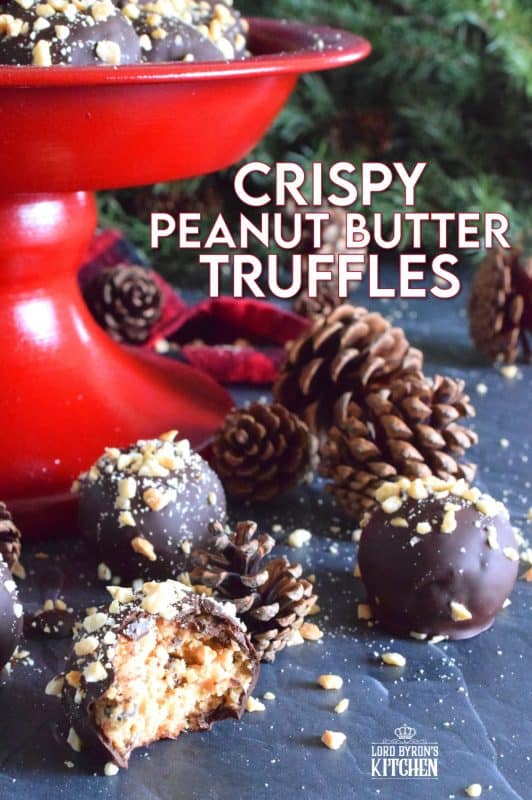 Dipped in melted milk chocolate and topped with chopped, salted peanuts, Crispy Peanut Butter Truffles are a delicious confection that not only melts in your mouth, but the inside has an airy and crispy bite from the Rice Krispies Cereal, peanuts, and chocolate chips. This truffle is for the serious peanut butter and chocolate lover! #christmas #holiday #nobake #truffles #peanutbutter #chocolate #ricekrispies