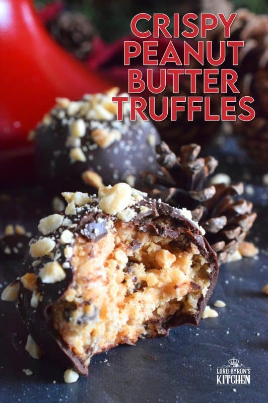Dipped in melted milk chocolate and topped with chopped, salted peanuts, Crispy Peanut Butter Truffles are a delicious confection that not only melts in your mouth, but the inside has an airy and crispy bite from the Rice Krispies Cereal, peanuts, and chocolate chips. This truffle is for the serious peanut butter and chocolate lover! #christmas #holiday #nobake #truffles #peanutbutter #chocolate #ricekrispies