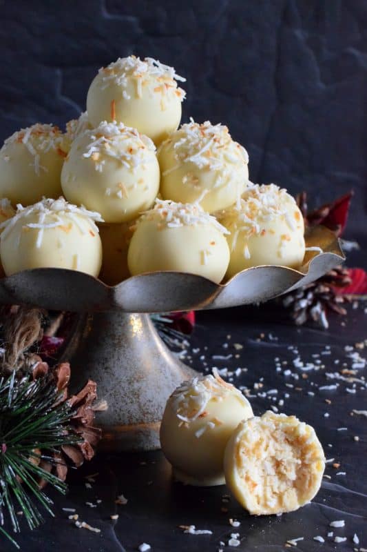 You will not believe how easy these Coconut Shortbread Truffles are to prepare! With lots of coconut flavour, these truffles are made with crumbled shortbread cookies and dipped in velvety white chocolate. Be sure to toast the coconut first to really get the best out of this holiday confection! #holiday #christmas #chocolate #truffles #coconut #nobake #cookies