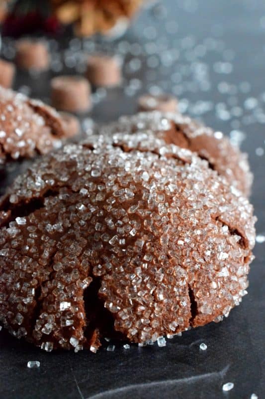 For the ultimate chocolate lover, these Rolo Stuffed Cookies are prepared with a rich chocolaty and fudgy base, which is wrapped around a single Rolo candy. When you bite into one of the cookies, milk chocolate and caramel oozes out - sounds indulgent, right? Perfect for Christmastime, when calories don't count! #christmas #holiday #baking #cookies #rolo #stuffedcookies #caramel #chocolate