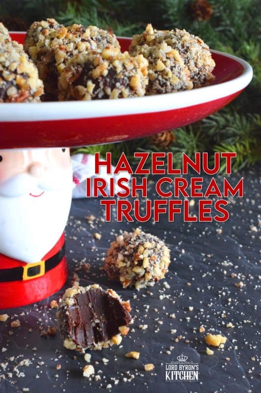Hazelnut Irish Cream Truffles are decadent, rich, and densely chocolaty. The creaminess and meltiness of the chocolate ganache mixture contrasts very well with the slight saltiness and crunchiness of the toasted hazelnuts. With just a touch of Irish Cream, these truffles are suitable for all ages! #nobake #truffles #christmas #holiday #boozy #chocolate #baileys #irishcream