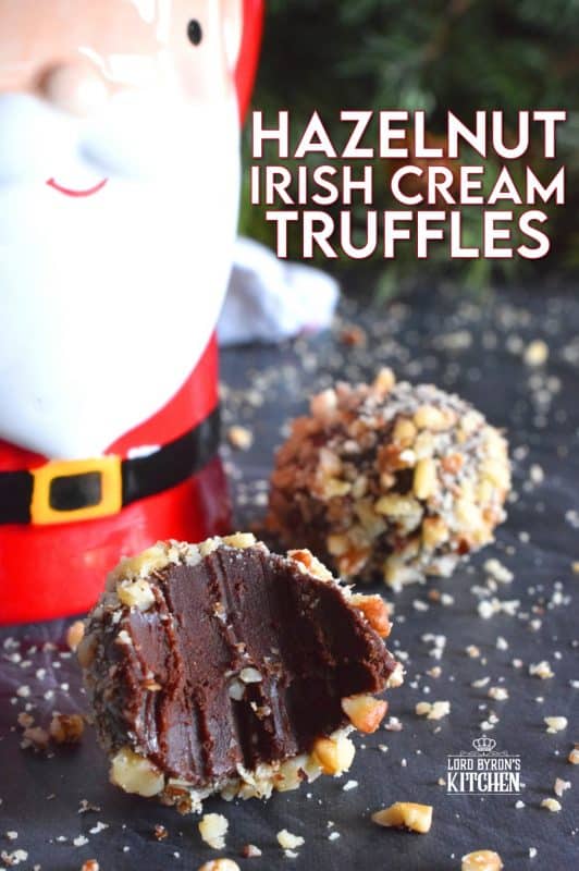 Hazelnut Irish Cream Truffles are decadent, rich, and densely chocolaty. The creaminess and meltiness of the chocolate ganache mixture contrasts very well with the slight saltiness and crunchiness of the toasted hazelnuts. With just a touch of Irish Cream, these truffles are suitable for all ages! #nobake #truffles #christmas #holiday #boozy #chocolate #baileys #irishcream