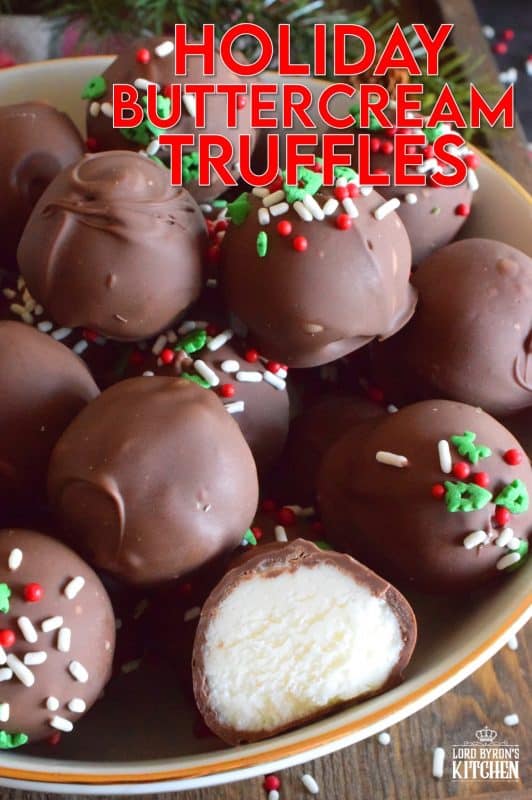When it comes to truffles that melt in your mouth, Holiday Buttercream Truffles are the best! The bright white centers are prepared with cream cheese and butter, just like the beginnings of a good cake frosting! Dipped in melted milk chocolate, it's hard to eat just one of these! #truffles #buttercream #cookies #nobake #christmas #holiday #chocolate