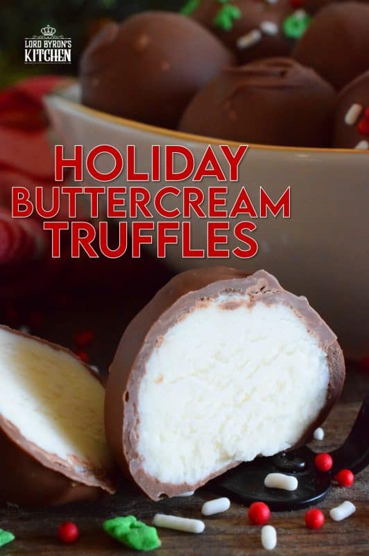 When it comes to truffles that melt in your mouth, Holiday Buttercream Truffles are the best! The bright white centers are prepared with cream cheese and butter, just like the beginnings of a good cake frosting! Dipped in melted milk chocolate, it's hard to eat just one of these! #truffles #buttercream #cookies #nobake #christmas #holiday #chocolate