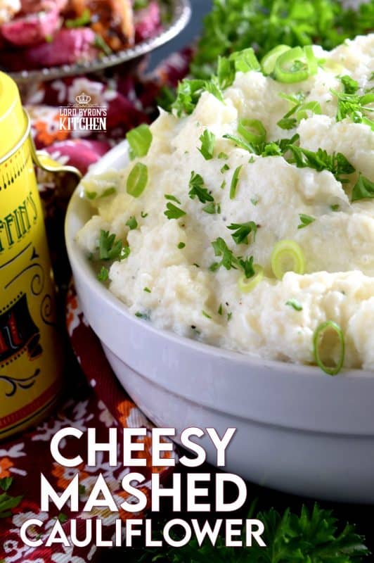 A mashed potato substitute that's health conscious and free of butter and heavy cream. Cheesy Mashed Cauliflower is creamy, flavourful, and delicious without all of the calories and extra fat. The addition of fresh green onions adds a crisp, refreshing taste. #cauliflower #creamcheese #mashedcauliflower #potatoalternative #mashed #thanksgiving #sidedish