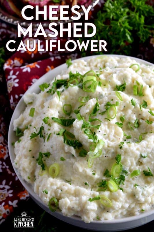 A mashed potato substitute that's health conscious and free of butter and heavy cream. Cheesy Mashed Cauliflower is creamy, flavourful, and delicious without all of the calories and extra fat. The addition of fresh green onions adds a crisp, refreshing taste. #cauliflower #creamcheese #mashedcauliflower #potatoalternative #mashed #thanksgiving #sidedish