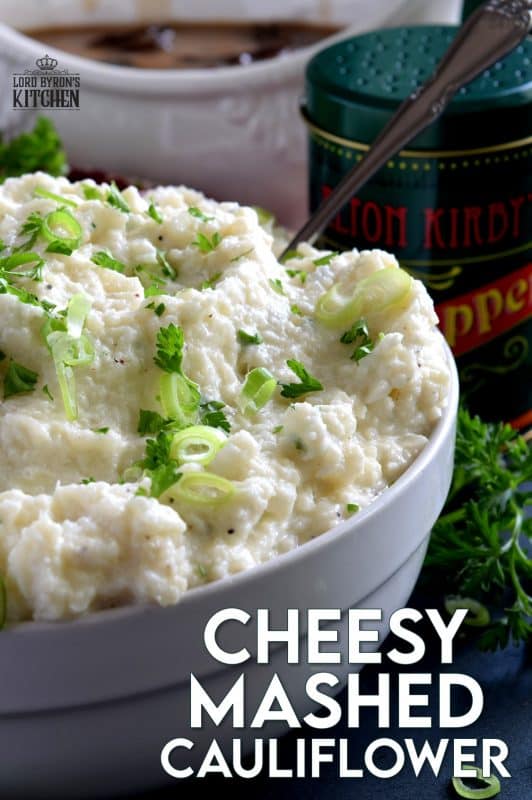 A mashed potato substitute that's health conscious and free of butter and heavy cream. Cheesy Mashed Cauliflower is creamy, flavourful, and delicious without all of the calories and extra fat. The addition of fresh green onions adds a crisp, refreshing taste. #cauliflower #creamcheese #mashedcauliflower #potatoalternative #mashed #thanksgiving #sidedish