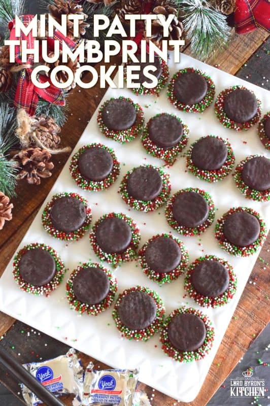 Christmastime is synonymous with thumbprint cookies, most often prepared with chocolates or preserves. So, let's shake it up a bit by pressing chocolate mint patties into the cookie dough. These are the perfect holiday confection for the mint lover in your life! #yorkpeppermint #peppermint #patties #mint #christmas #holiday #baking #thumbprint #cookies
