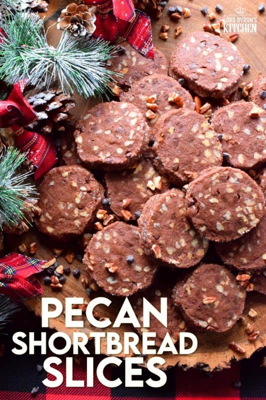 Pecan Shortbread Slices are one of those cookies you can make long in advance. They are rolled into a log, well wrapped, and can be refrigerated or frozen until you feel like baking. They are packed with toasted pecans and prepared with good cocoa and mini chocolate chips for extra chocolatey flavour. #shortbread #christmas #holiday #baking #cookies #chocolate #freezer #slices