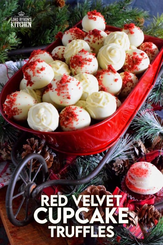 Looking for a quick and easy, yet affordable and delicious truffle recipe? How about these Red Velvet Cupcake Truffles? Use deconstructed cupcakes to make the centers and then dip them into melted white chocolate! You never have to tell anyone they weren't prepared from scratch! Who's going to know otherwise?? #redvelvet #chocolate #truffles #cupcakes #christmas #holiday #nobake