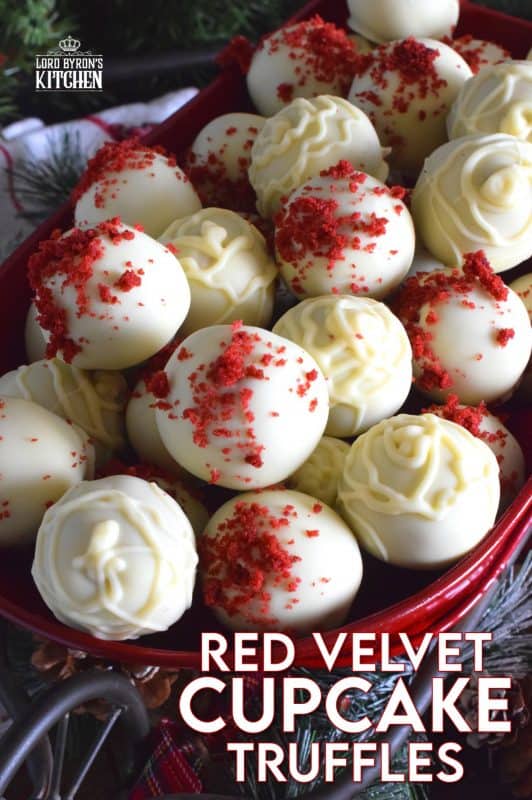 Looking for a quick and easy, yet affordable and delicious truffle recipe? How about these Red Velvet Cupcake Truffles? Use deconstructed cupcakes to make the centers and then dip them into melted white chocolate! You never have to tell anyone they weren't prepared from scratch! Who's going to know otherwise?? #redvelvet #chocolate #truffles #cupcakes #christmas #holiday #nobake