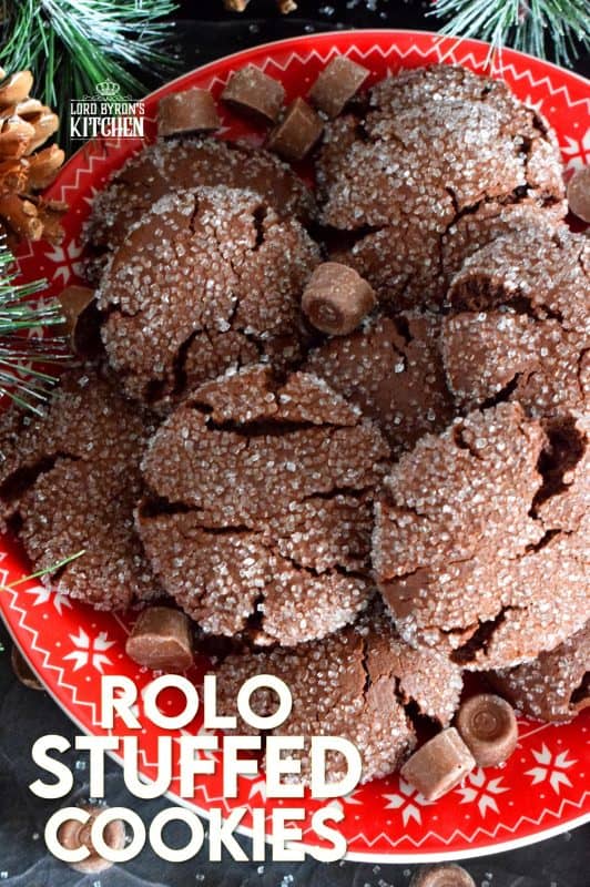 For the ultimate chocolate lover, these Rolo Stuffed Cookies are prepared with a rich chocolaty and fudgy base, which is wrapped around a single Rolo candy. When you bite into one of the cookies, milk chocolate and caramel oozes out - sounds indulgent, right? Perfect for Christmastime, when calories don't count! #christmas #holiday #baking #cookies #rolo #stuffedcookies #caramel #chocolate