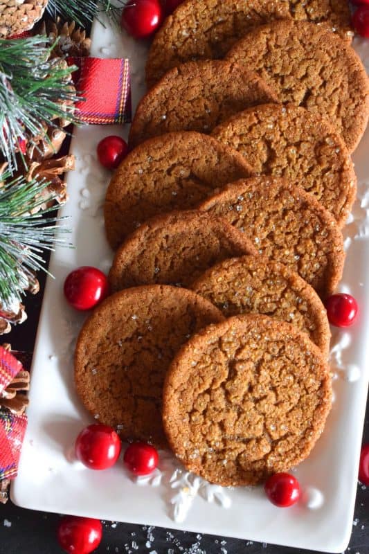 What is Christmas without gingerbread? Crispy Gingerbread Cookies will fulfill all of those cravings for homestyle, comforting, holiday flavours! Everyone loves gingerbread, but not everyone has the patience or time to roll out dough and dig out the cookie cutters. These cookies have that classic flavour you crave baked into a flat, crispy cookie - no decorating skills or rolling pins needed! #gingerbread #crispy #cookies #christmas #molasses