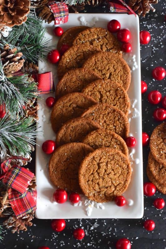 What is Christmas without gingerbread? Crispy Gingerbread Cookies will fulfill all of those cravings for homestyle, comforting, holiday flavours! Everyone loves gingerbread, but not everyone has the patience or time to roll out dough and dig out the cookie cutters. These cookies have that classic flavour you crave baked into a flat, crispy cookie - no decorating skills or rolling pins needed! #gingerbread #crispy #cookies #christmas #molasses