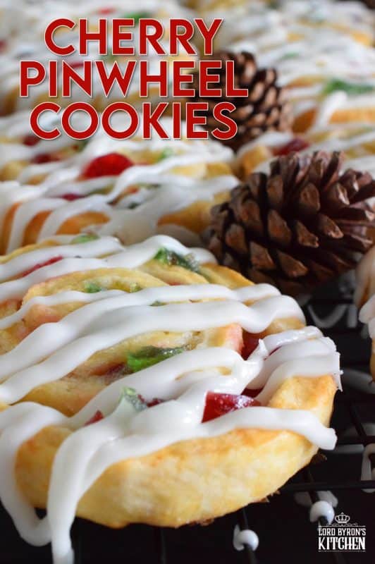 One of my favourite Christmas ingredients is being put to great use today! Cherry Pinwheel Cookies are made with a light, biscuit-like dough and rolled with red and green candied cherries. Drizzled with a basic sweet icing, these are absolutely delicious and very festive too! #christmas #holiday #baking #cherries #candiedcherries #cherry #redandgreen #drizzle