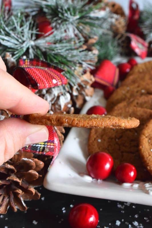 What is Christmas without gingerbread? Crispy Gingerbread Cookies will fulfill all of those cravings for homestyle, comforting, holiday flavours! Everyone loves gingerbread, but not everyone has the patience or time to roll out dough and dig out the cookie cutters. These cookies have that classic flavour you crave baked into a flat, crispy cookie - no decorating skills or rolling pins needed! #gingerbread #crispy #cookies #christmas #molasses