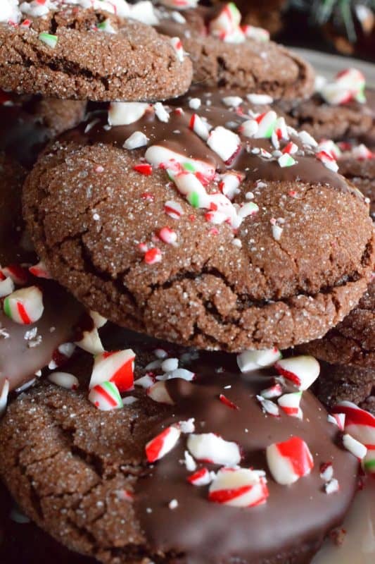 Double Chocolate Peppermint Cookies are loaded with peppermint flavour from both the extract and the crushed candy canes. These already pack a deep chocolate flavour, but they're dipped in chocolate anyway for even more chocolatey goodness! Christmas is for giving and sharing, but you might want to keep this one all to yourself! #doublechocolate #peppermint #candycanes #christmas #holiday #baking