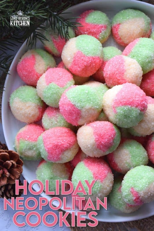 Holiday Neopolitan Cookies are two-bite cookies made with red, green, and white cookie dough. They are rolled in sugar and baked for a cute and festive Christmas confection. Use different extracts in each dough colour or prepare them with just good vanilla! #neopolitan #christmas #holiday #cookies #redandgreen