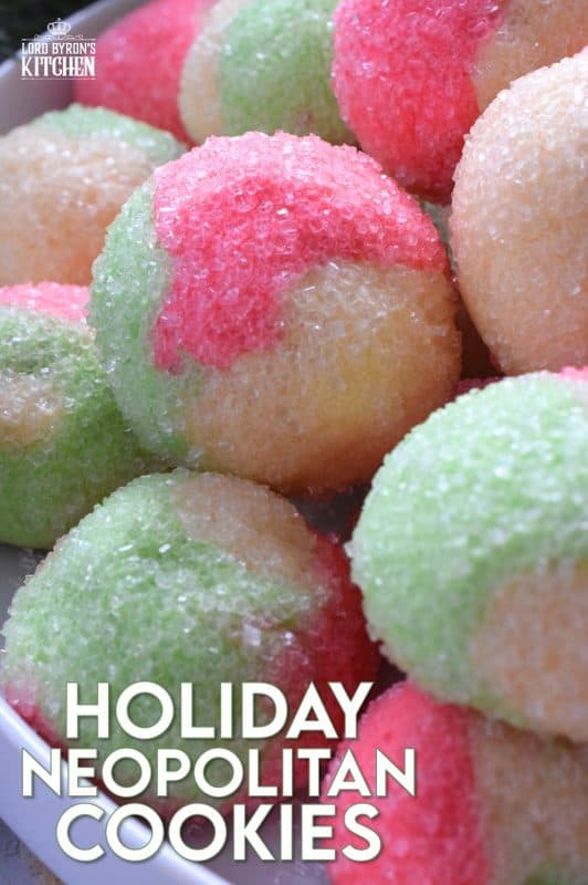 Holiday Neopolitan Cookies are two-bite cookies made with red, green, and white cookie dough. They are rolled in sugar and baked for a cute and festive Christmas confection. Use different extracts in each dough colour or prepare them with just good vanilla! #neopolitan #christmas #holiday #cookies #redandgreen