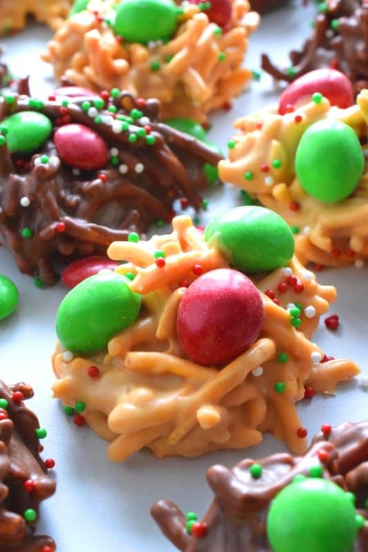 No Bake Haystack Cookies have been around for years! This recipe is super easy to make and everyone seems to love them. Make them 2 different ways and pile them onto your holiday cookie platter. Will you make the peanut butter or chocolate version - or even both!? #haystack #nobake #christmas #holiday #cookies #chocolate #peanutbutter