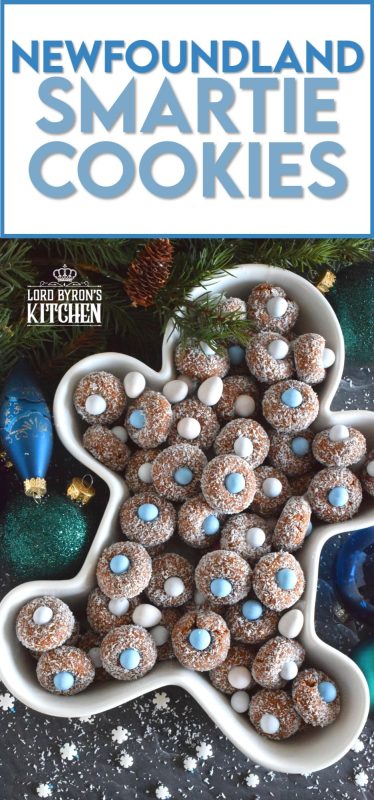 Prepared with melted marshmallows, cocoa, and graham crumbs, Newfoundland Smartie Cookies are sure to give you smores vibes. The addition of the candy coated chocolate in the center helps to make this cookie feel and look more festive. #smarties #newfoundland #christmas #nobake #cookies #newfie
