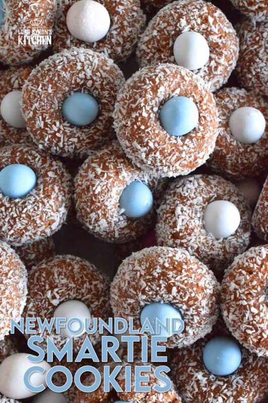 Prepared with melted marshmallows, cocoa, and graham crumbs, Newfoundland Smartie Cookies are sure to give you smores vibes. The addition of the candy coated chocolate in the center helps to make this cookie feel and look more festive. #smarties #newfoundland #christmas #nobake #cookies #newfie