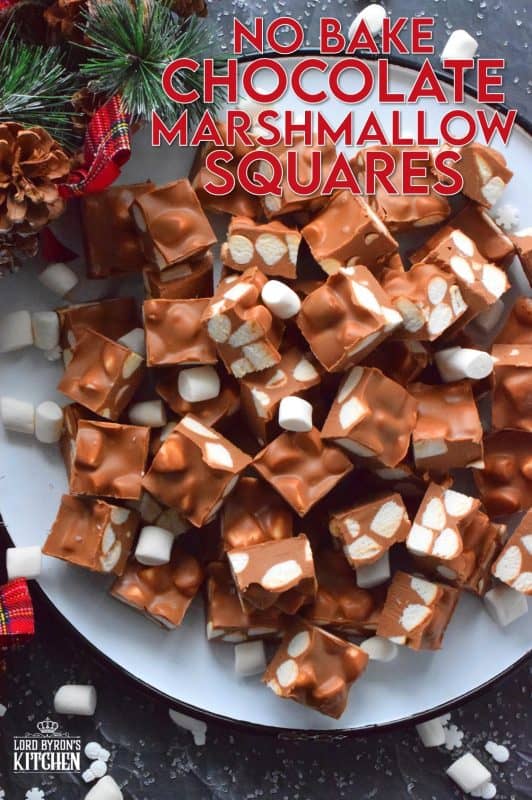 In all probability, this will be the best thing you will eat this holiday season. No Bake Chocolate Marshmallow Squares are prepared with only four ingredients and comes together in just minutes with the help of a microwave. These are decadent and rich, and you won't be able to stop eating them! #christmas #holidays #chocolate #nobake #peanutbutter #treats
