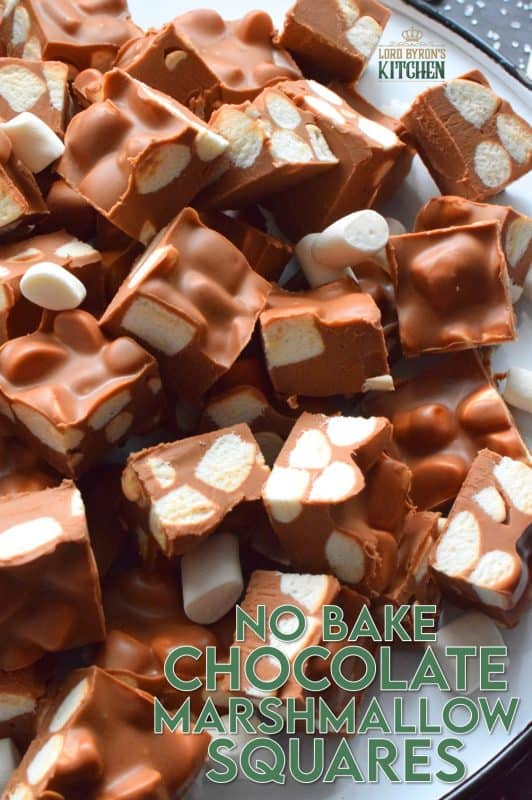 In all probability, this will be the best thing you will eat this holiday season. No Bake Chocolate Marshmallow Squares are prepared with only four ingredients and comes together in just minutes with the help of a microwave. These are decadent and rich, and you won't be able to stop eating them! #christmas #holidays #chocolate #nobake #peanutbutter #treats