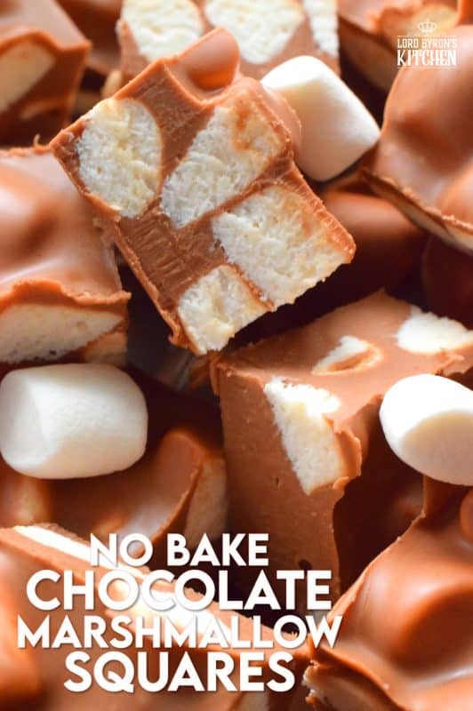 In all probability, this will be the best thing you will eat this holiday season. No Bake Chocolate Marshmallow Squares are prepared with only four ingredients and comes together in just minutes with the help of a microwave. These are decadent and rich, and you won't be able to stop eating them! #christmas #holidays #chocolate #nobake #peanutbutter #treats